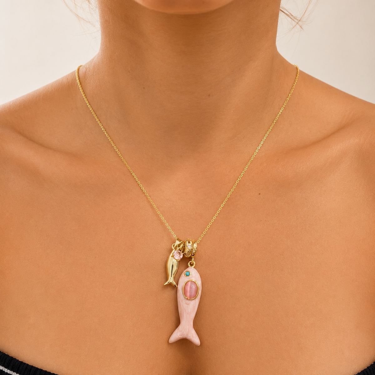 Golden Fish necklace with pink enamel fish charm and gold chain