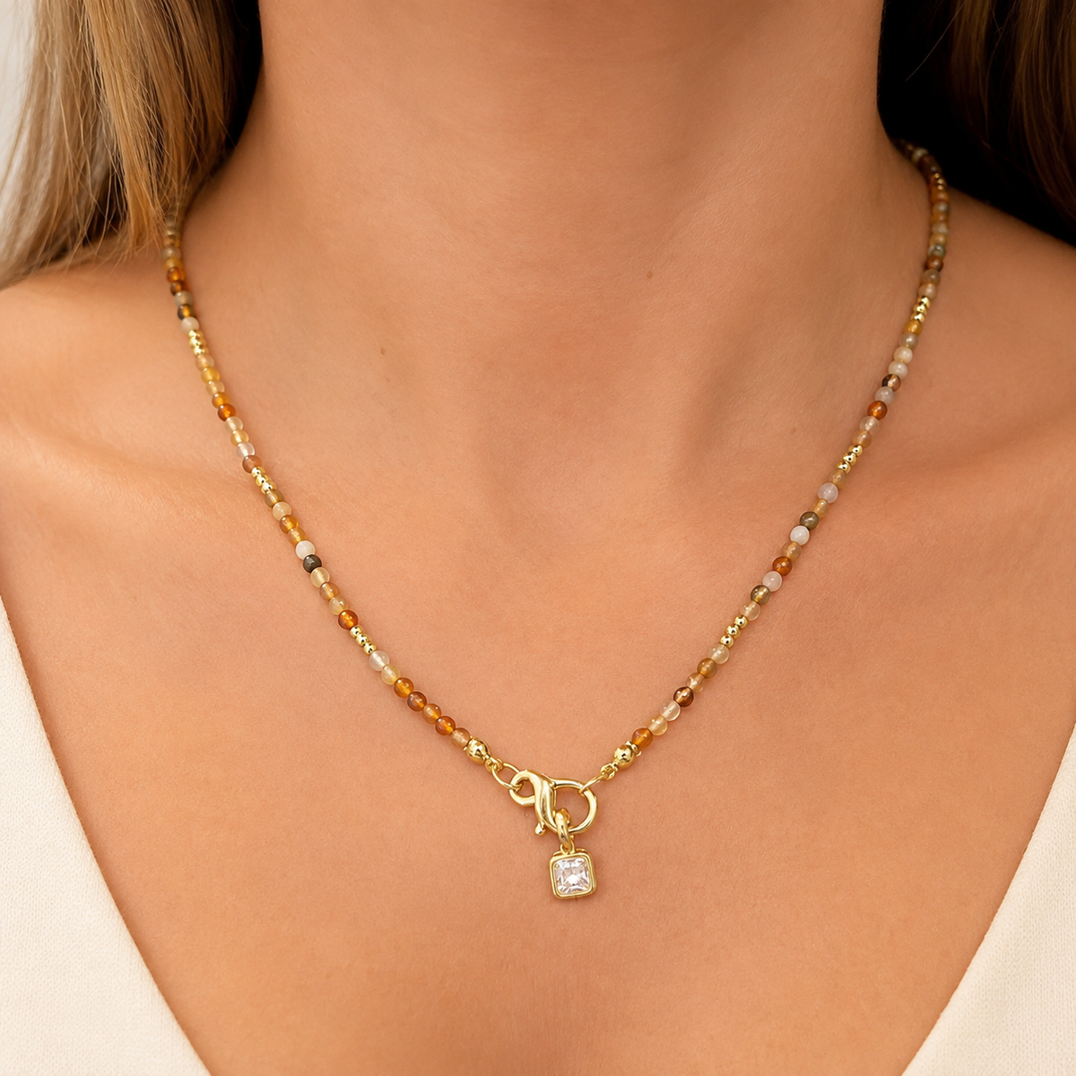 Natural Stone Brown beaded necklace with gold toggle clasp and square crystal pendant